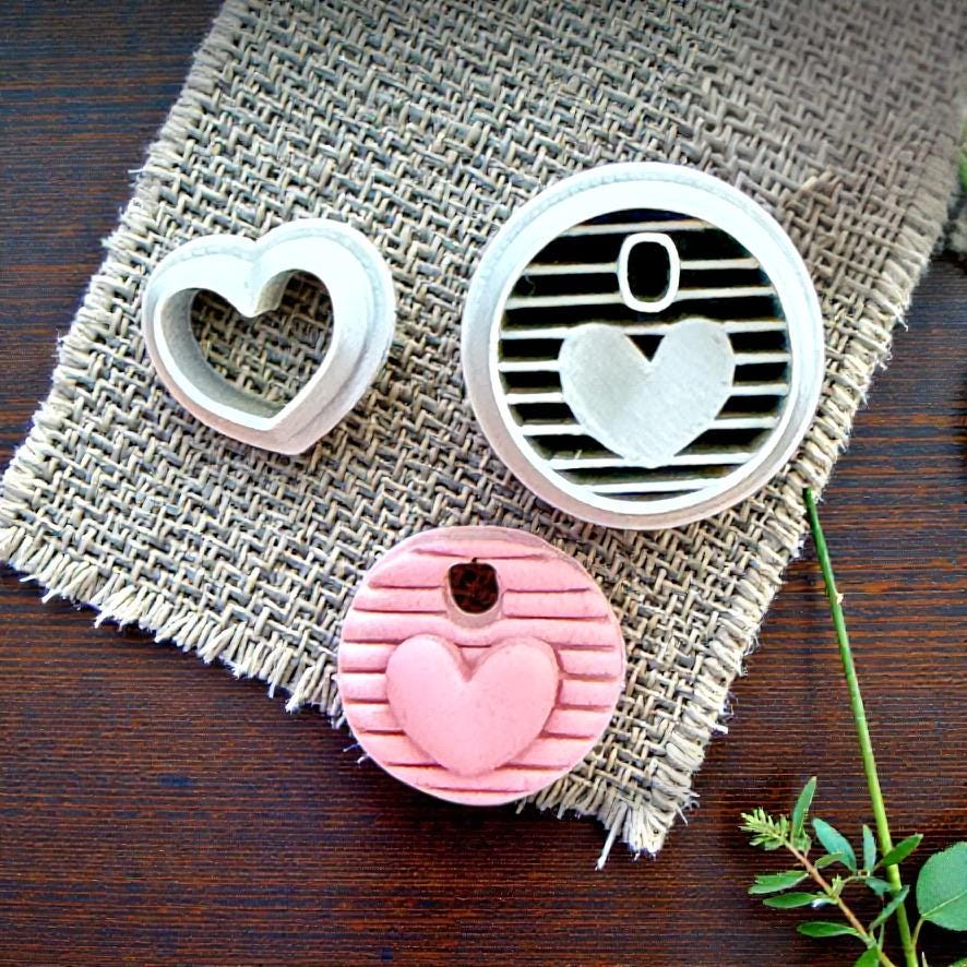 striped round cutter and clay impression