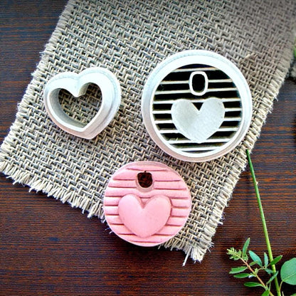 striped round cutter and clay impression