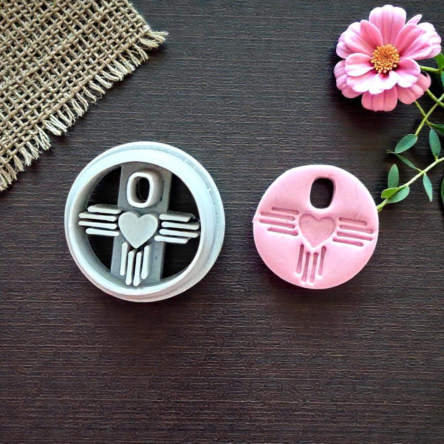 heat zia round cutter and clay impression