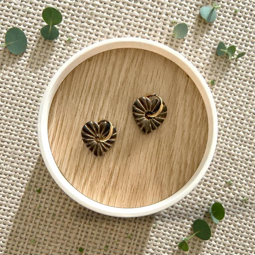 black and gold sunburst huggie earring