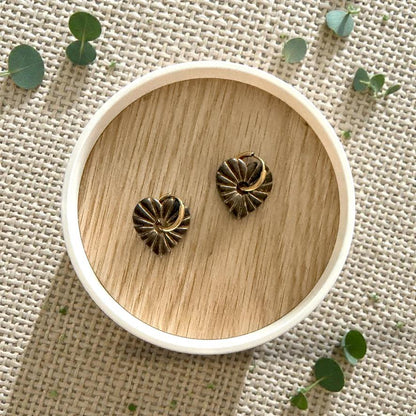 black and gold sunburst huggie earring