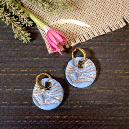 blue and gold matisse flower huggies