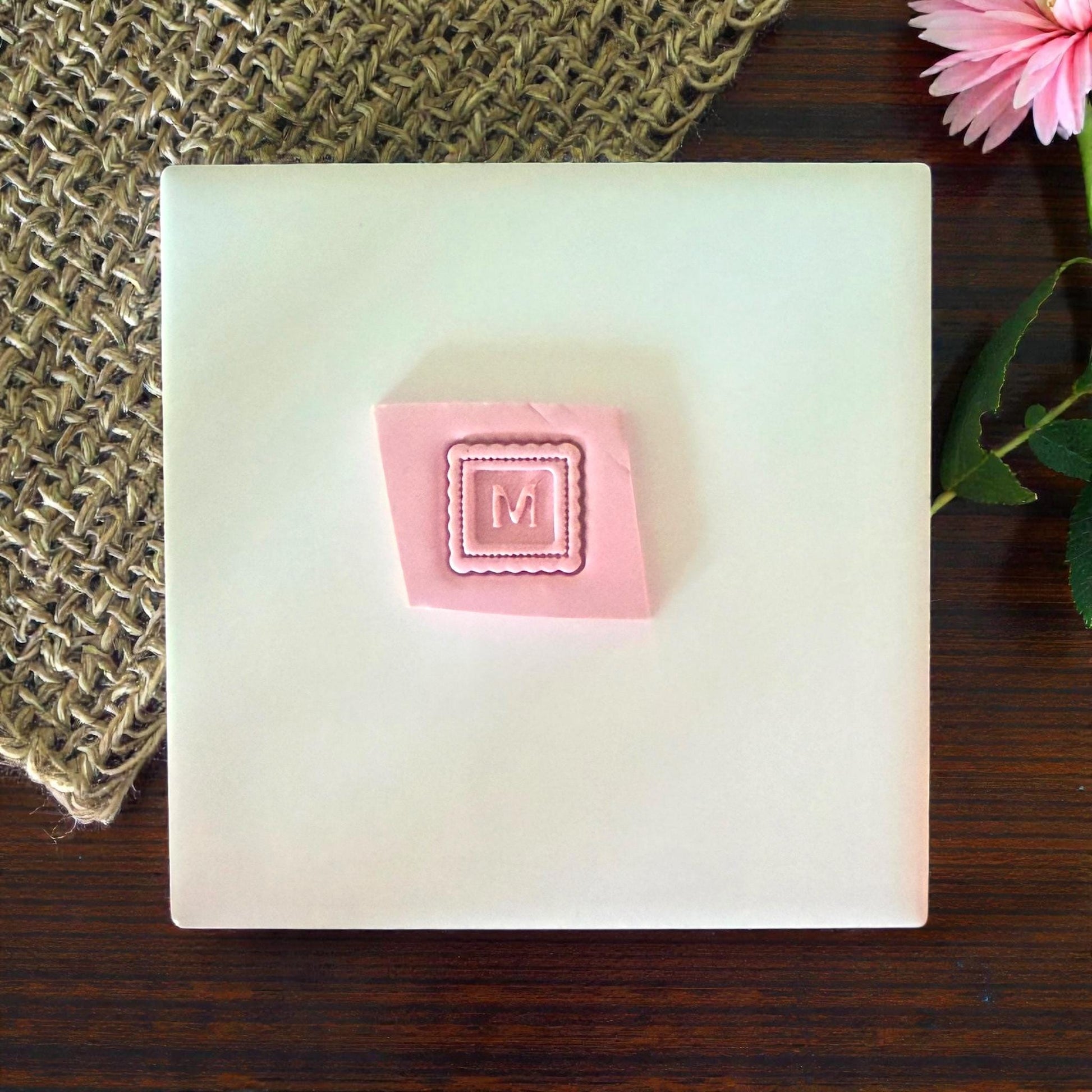 monogram m clay impression example