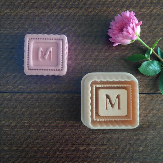 small and large letter m scallop cutters