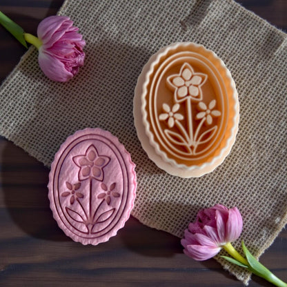 pink and tan floral cameo cutters shown together