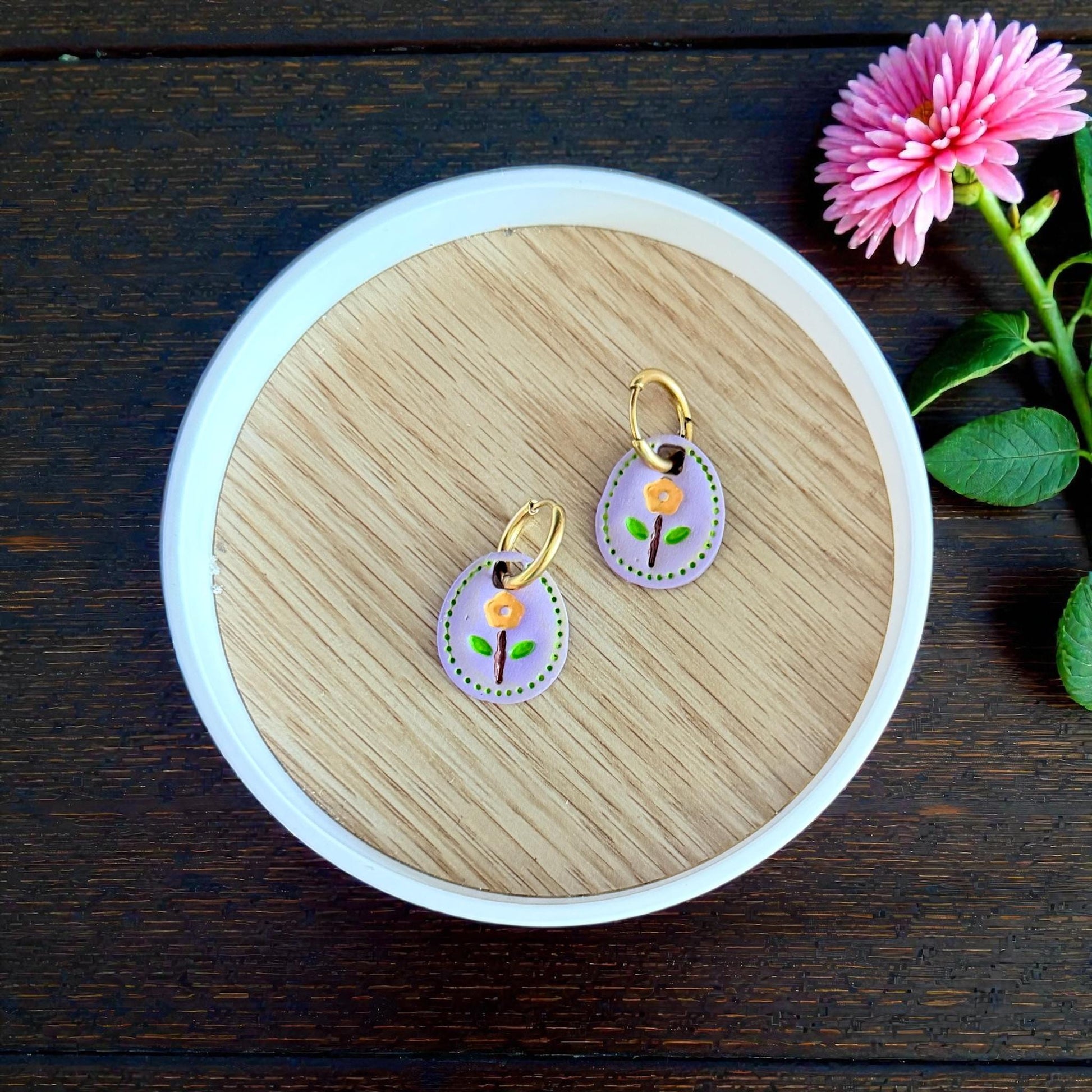 painted floral oval clay charms on huggie earrings