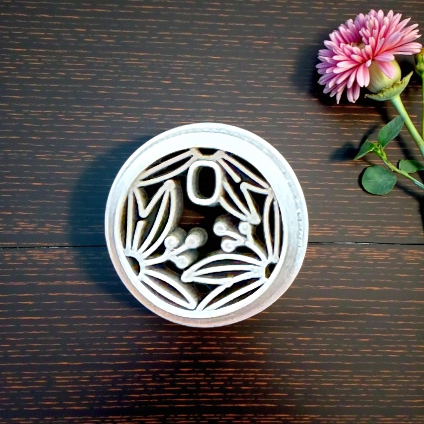 small botanical round cutter on tile