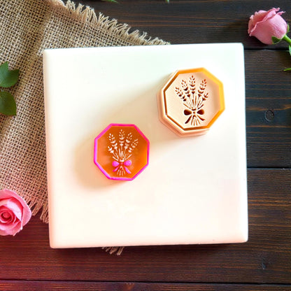 Wheat bouquet cutter and impression displayed together