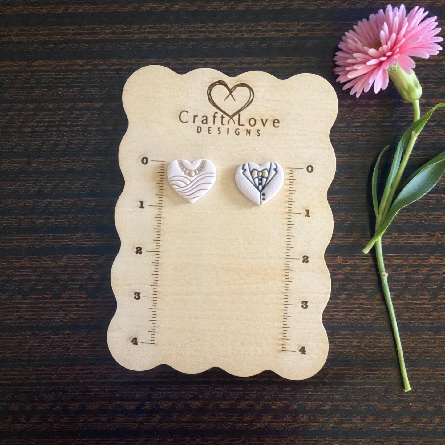 bride groom cutters on sizing board