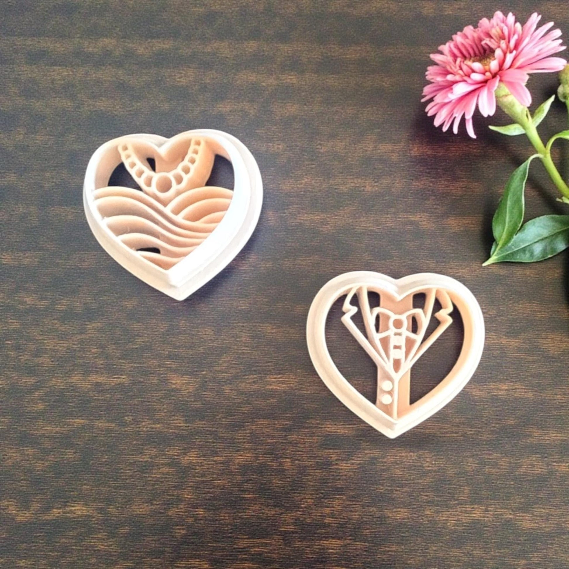 bride and groom cutters on wood