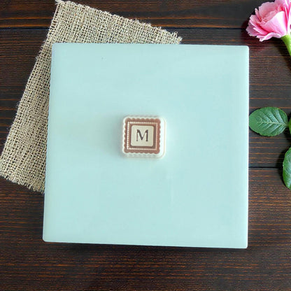 letter m mother cutter on display board