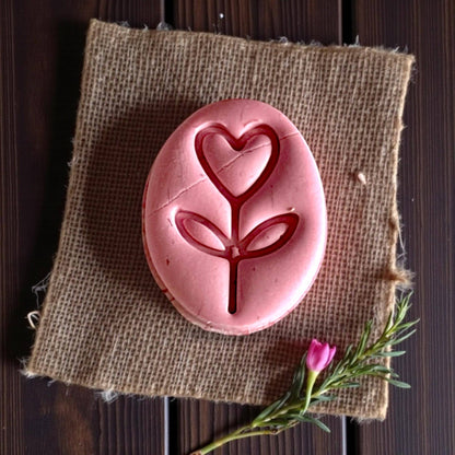 large heart stem clay imprint on burlap