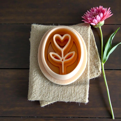 heart stem imprint on burlap with pink flower