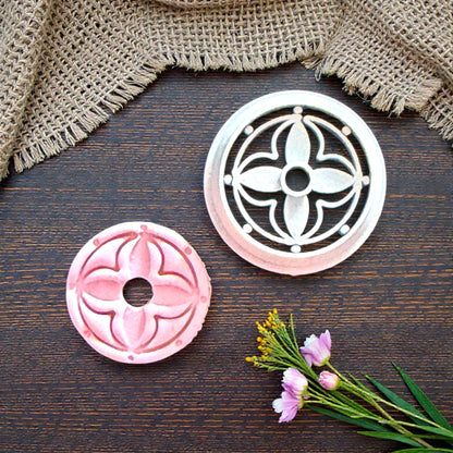 round floral clay cutter with pink impression