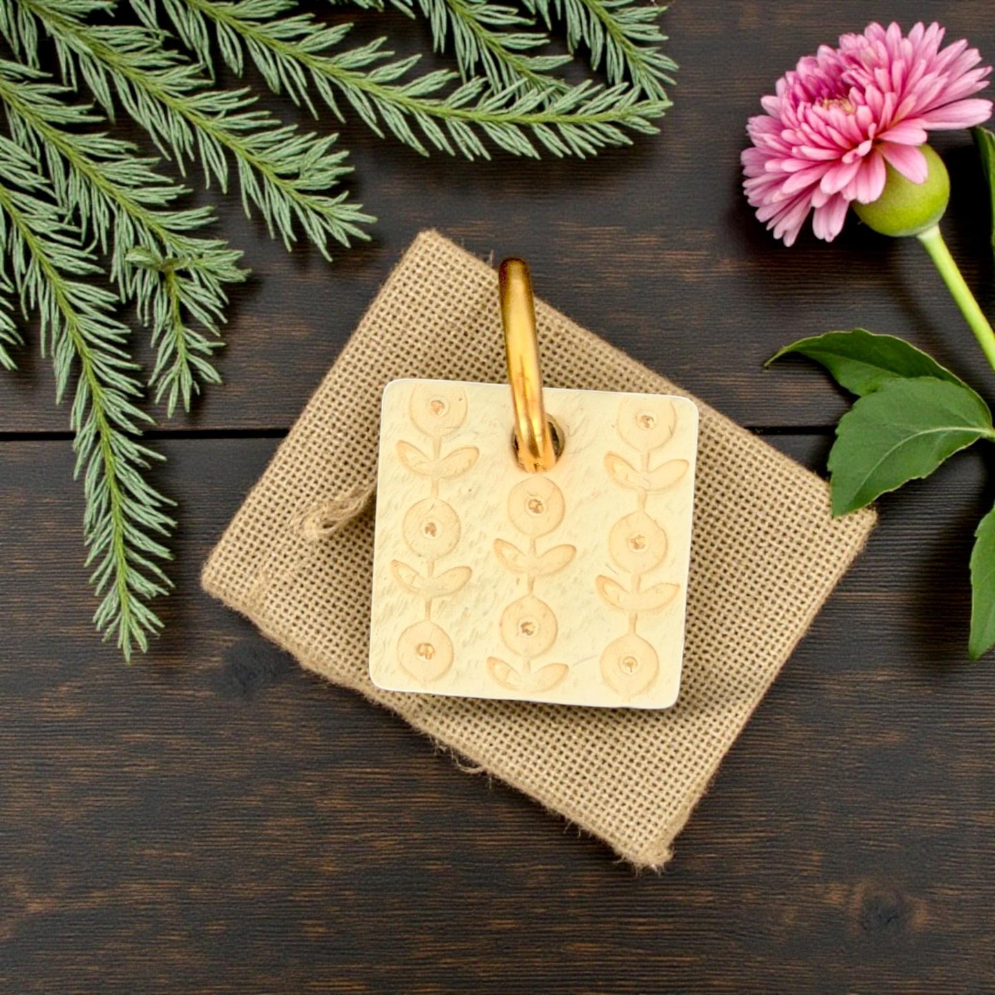 floral imprint in yellow clay close-up