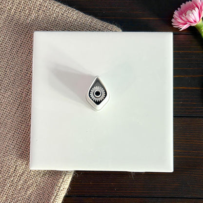 teardrop clay cutter on white tile