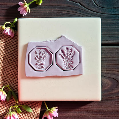 Wheat bouquet cutters pressed into purple clay sheet