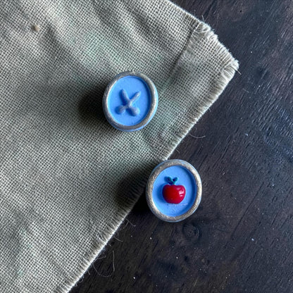 back to school clay cutter studs shown on measurement board