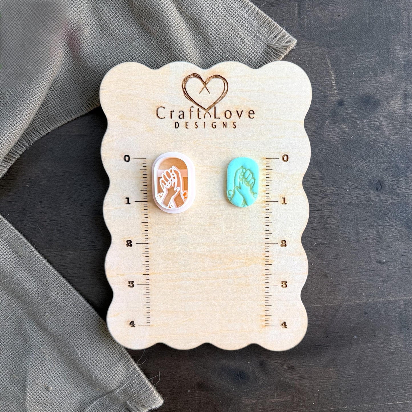 mom baby hands clay cutter with teal clay finished sample