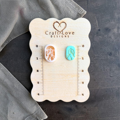 mom baby hands clay cutter with teal clay finished sample