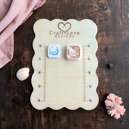 whale polymer clay cutters on measuring board coastal design
