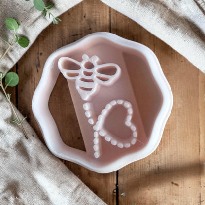 bee heart polymer clay cutter inside organic hex frame