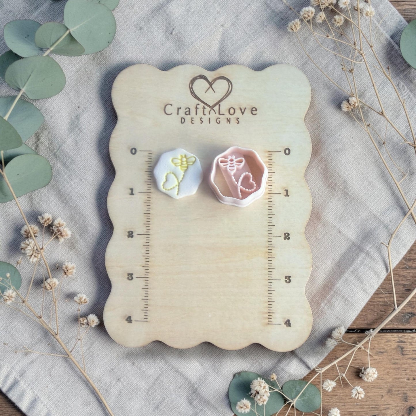 bee heart clay cutters on measuring board craft love designs