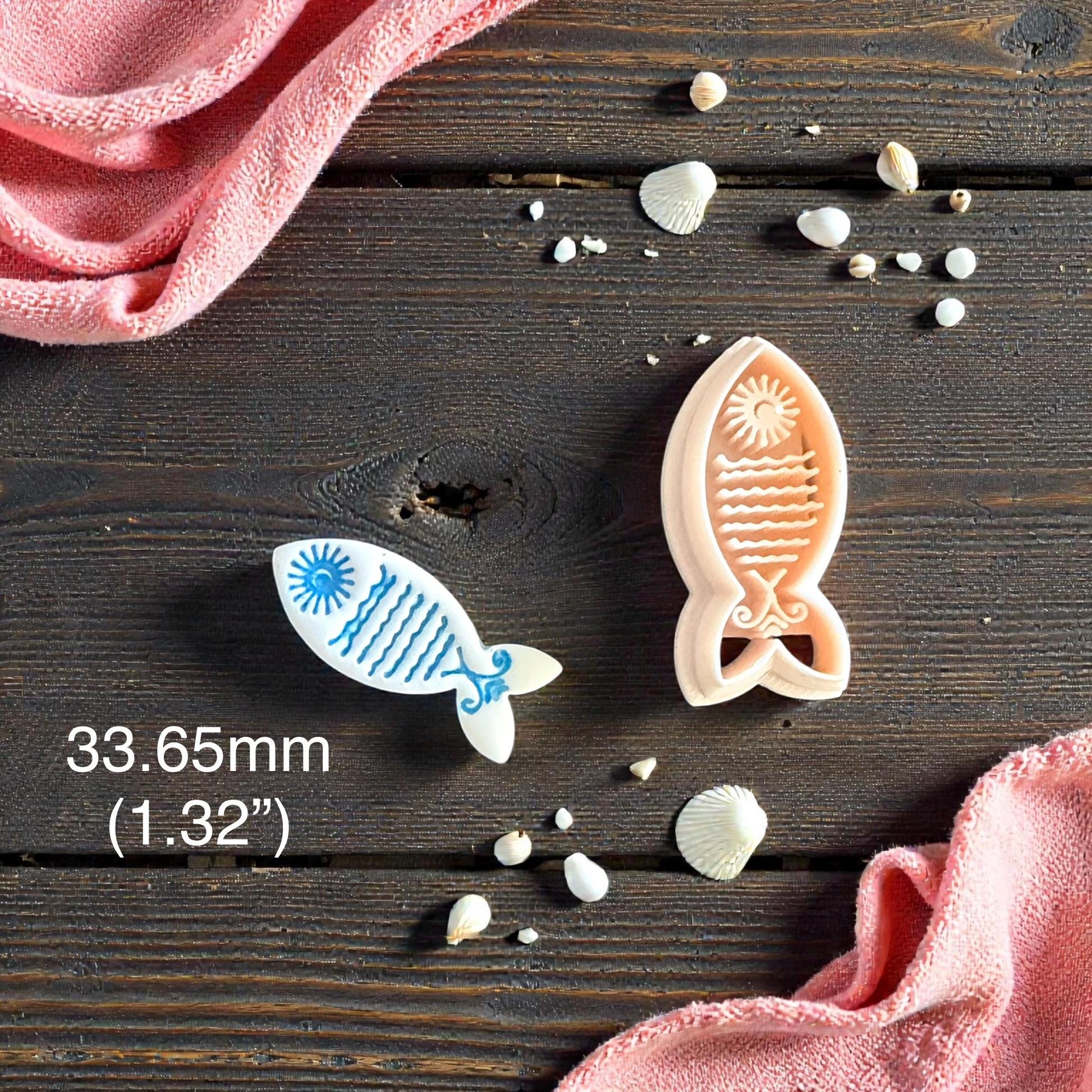 sun fish cutter and imprint shown with measurement label