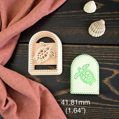 two arched turtle imprints on measuring board