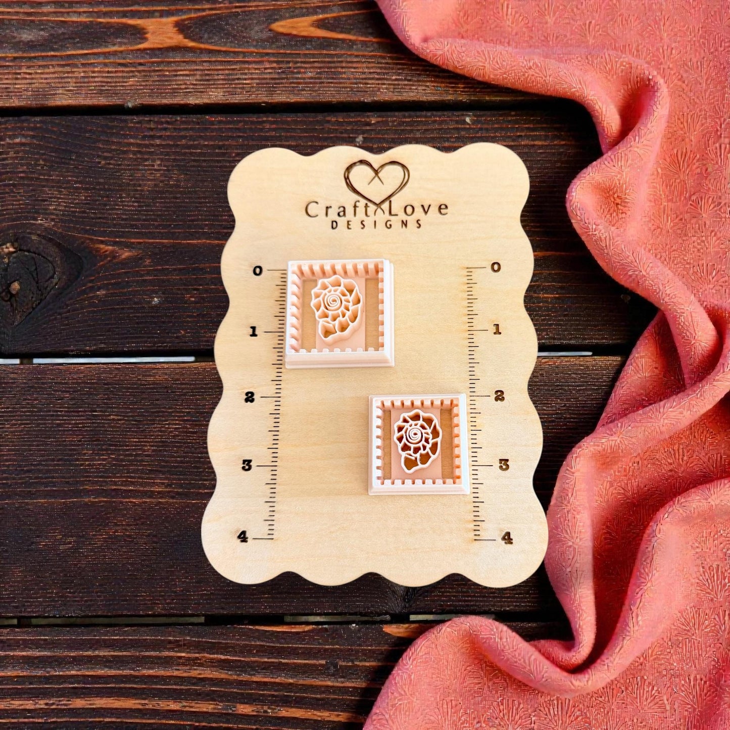 two square shell cutters displayed on CraftLove Designs wooden measurement board