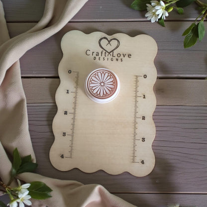 round floral cutter on sizing card