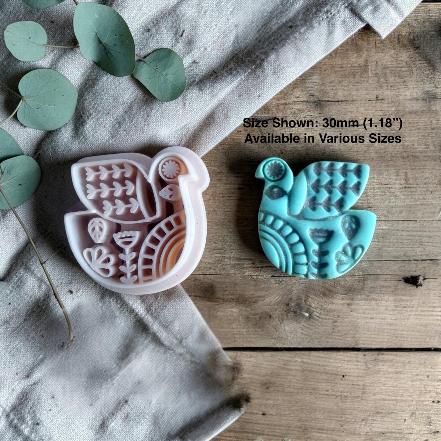bird clay cutter and finished turquoise bird charm with size text on linen