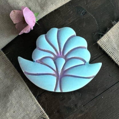 A close-up showing the thin, crisp cutting walls of the Art Deco flower tool, highlighting the geometric petal layers.