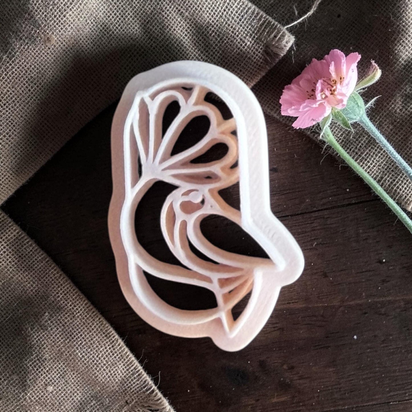 Bird under flower polymer clay cutter.