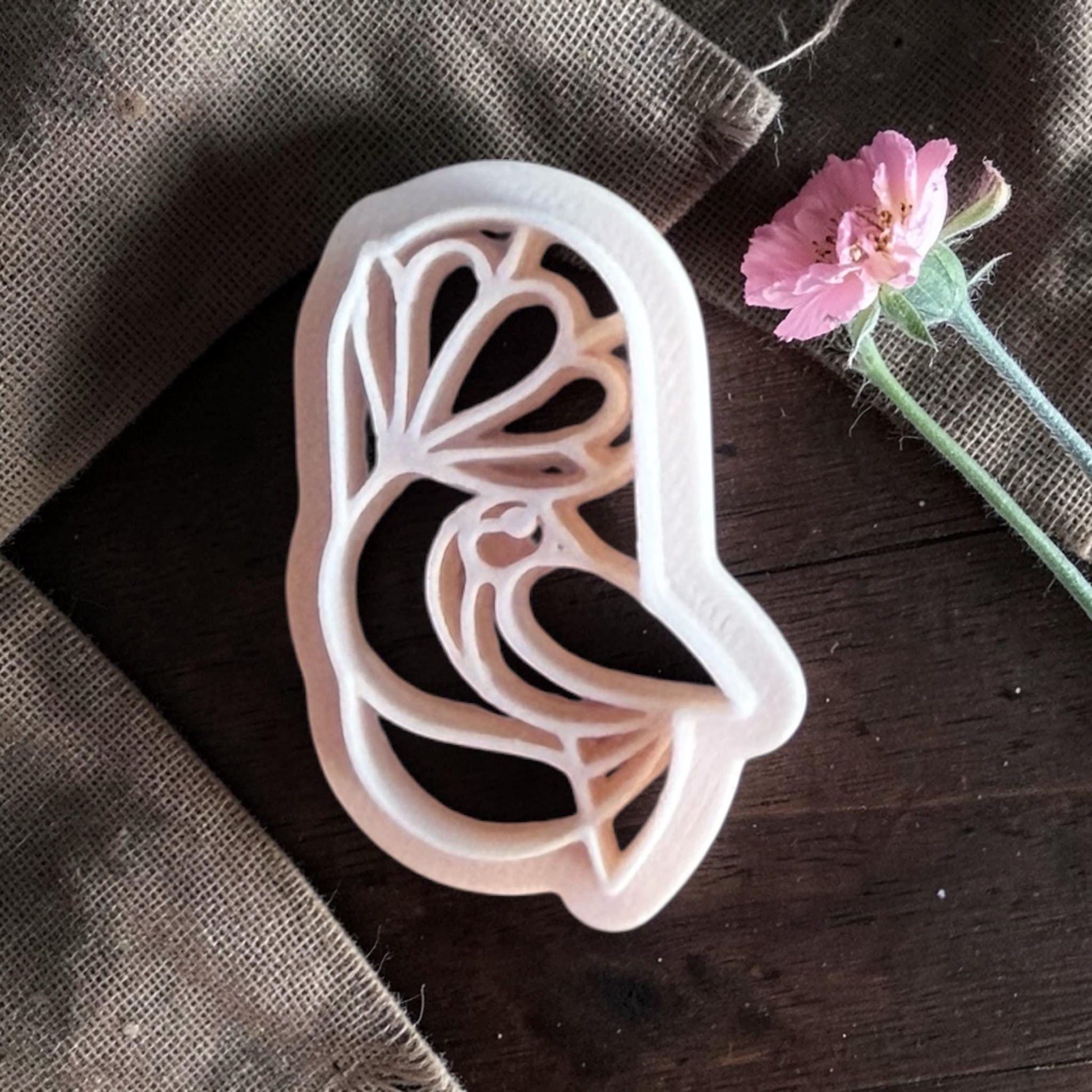 Bird under flower polymer clay cutter.