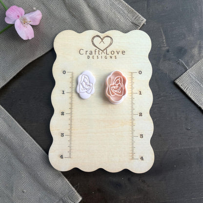Mother and baby cutter and matching clay imprint side by side on Craft Love Designs board