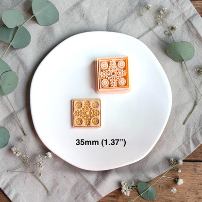 Polymer clay cutter and finished square clay piece side by side with text showing size 35mm on a white plate.