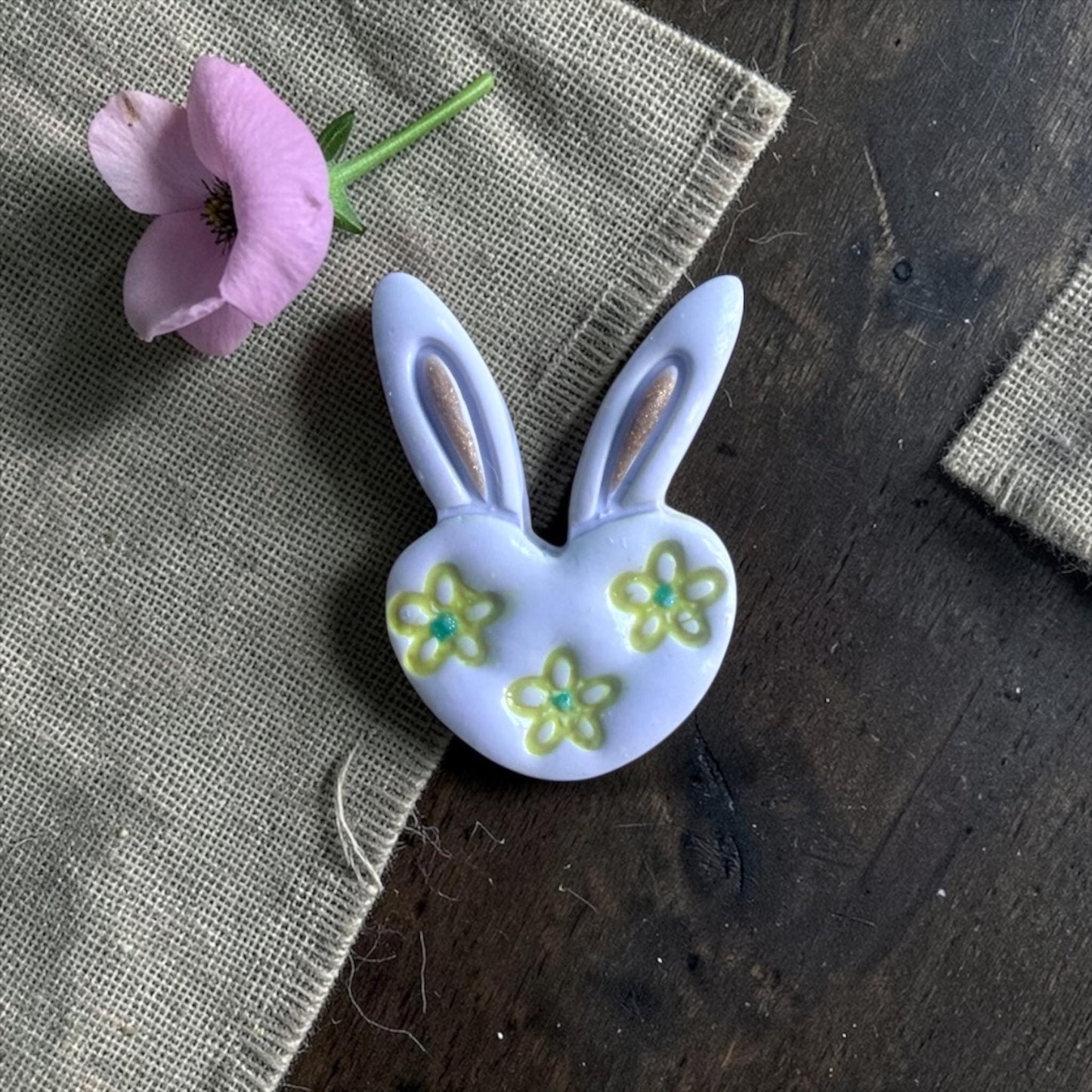 spring bunny clay cutter styled with burlap and pink flower