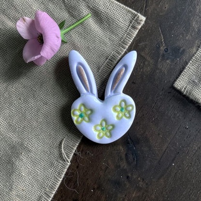 spring bunny clay cutter styled with burlap and pink flower