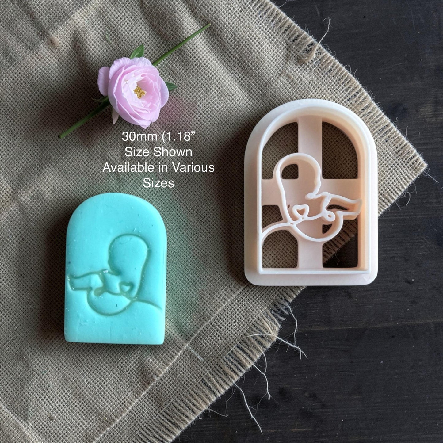 baby silhouette polymer clay cutter with finished clay example