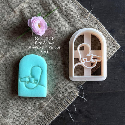 baby silhouette polymer clay cutter with finished clay example