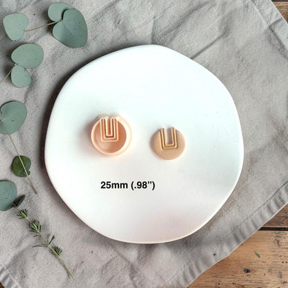 U cutout round cutter and clay piece