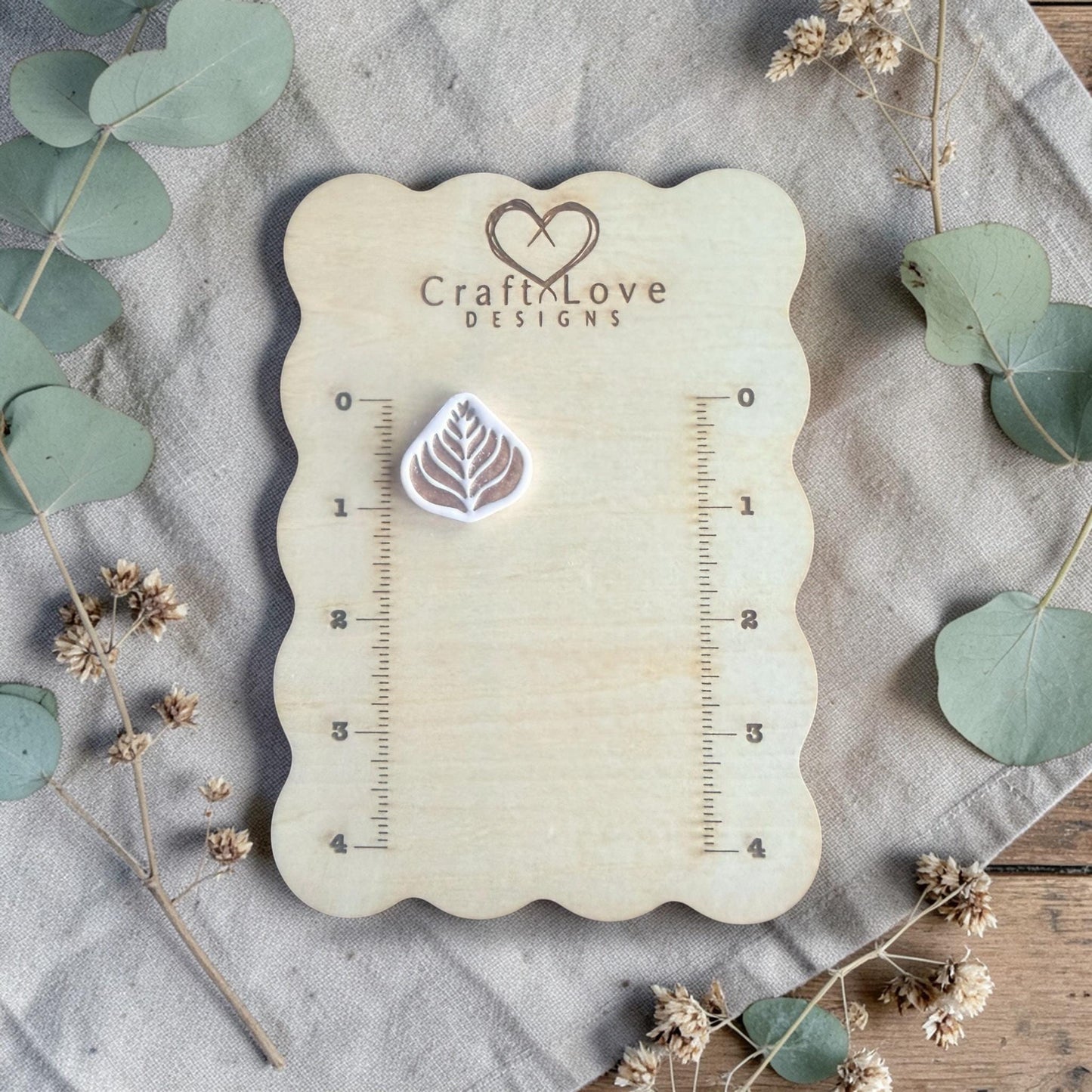 latte love leaf polymer clay cutters on measuring board