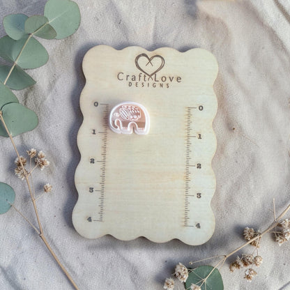 white elephant clay cutter displayed on Craft Love Designs ruler board