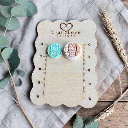 turquoise tulip clay charm and cutter on Craft Love Designs ruler board