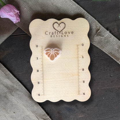 polymer clay flower cutter displayed on Craft Love Designs ruler board
