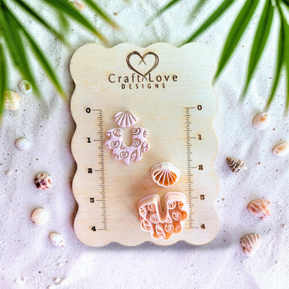 Clay cutter set displayed on measurement board showing size and scale for earring making