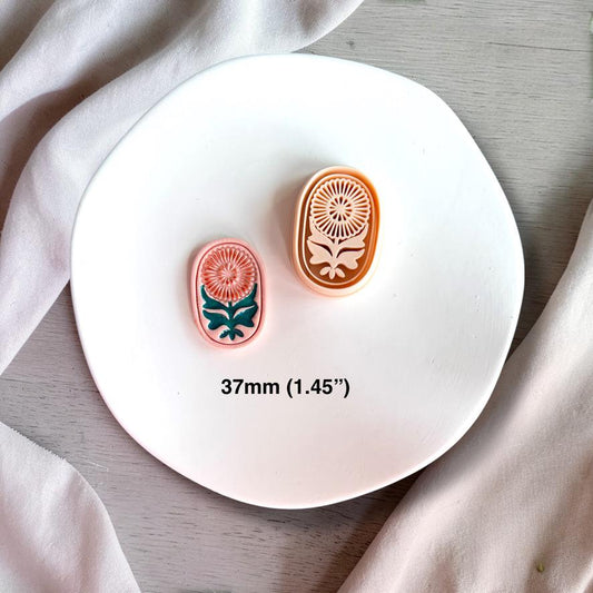 37mm oval floral polymer clay cutter with example and imprint shown