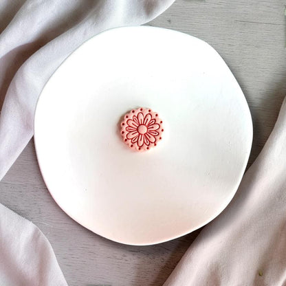 Close-up of round floral cutter with petal details