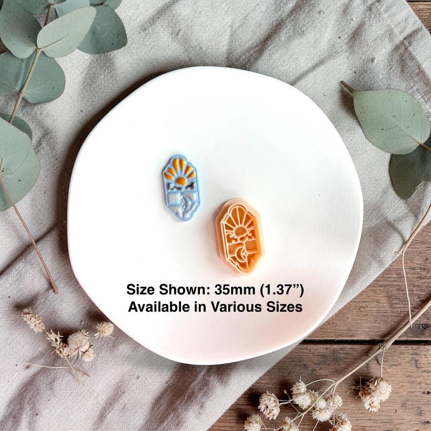 Sky and moon clay samples with cutter showing 35mm size reference on white plate